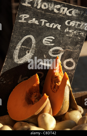 Vegetable market stall with price written on a blackboard Stock Photo