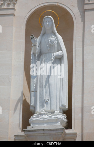 Statue of the Virgin Mary on the Basilica at Fatima, Portugal. Stock Photo