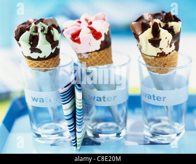 Three different flavored ice cream cones Stock Photo