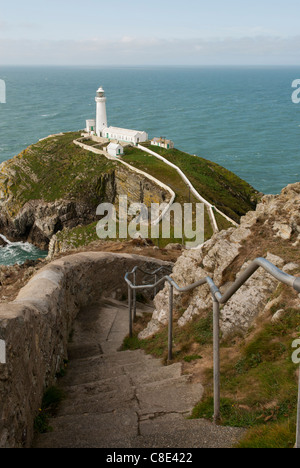 Steep steps leading down the cliff side to South Stack Lighthouse, Anglesey, Wales. Stock Photo