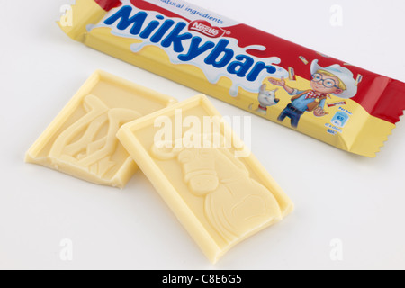 Two Small bars of Nestle Milky Bar white chocolate with a horse character Stock Photo
