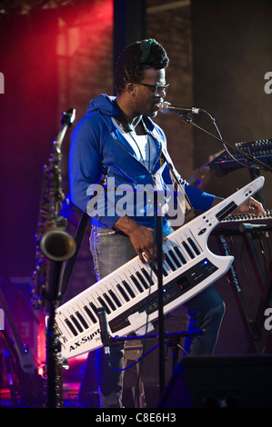 Casey Benjamin playing a Roland AX-Synth shoulder synthesizer on stage with Robert Glasper Experiment Brecon Jazz Festival 2011 Stock Photo