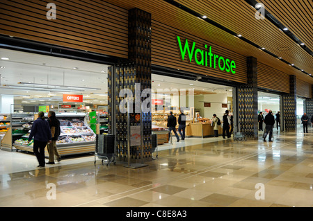 Waitrose supermarket food store front grocery shopping mall access within a Westfield shopping centre at Stratford City East London Newham England UK Stock Photo