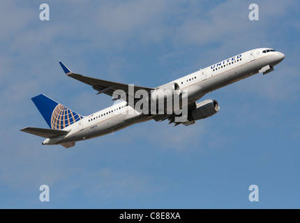United Airlines Boeing 757-200 passenger jet plane climbing on takeoff as it departs on a transatlantic flight Stock Photo