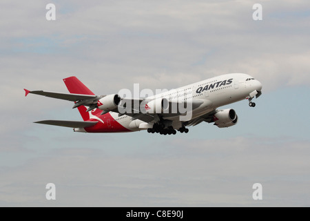 Qantas Airbus A380 superjumbo departing from Heathrow on a long haul intercontinental flight