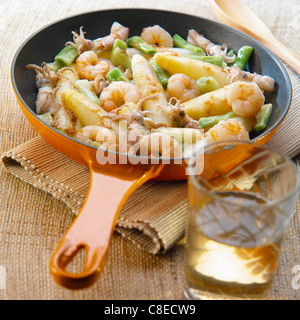 Pan-fried white asparagus,shrimps and octopus Stock Photo