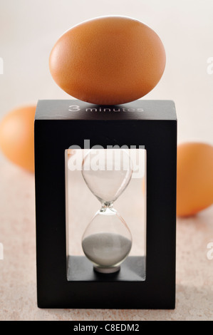 Eggs and timer Stock Photo - Alamy