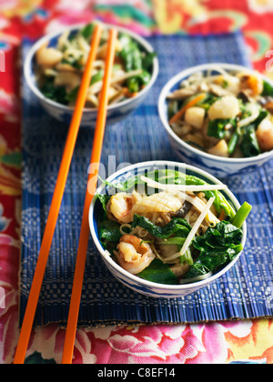 Sauteed noodles with shrimps and vegetables Stock Photo
