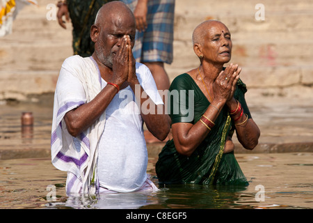 Couple bathing in the Ganges. Varanasi, India Stock Photo - Alamy