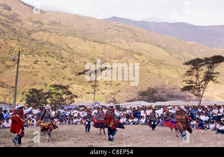 Quillabamba, Peru. Traditional dancers in traditional dress performing at a festival in the open air. Stock Photo