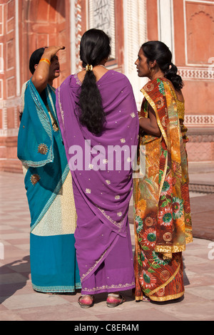 Indian women at South Gate of The Taj Mahal, Darwaza-i rauza in Uttar Pradesh, India Stock Photo