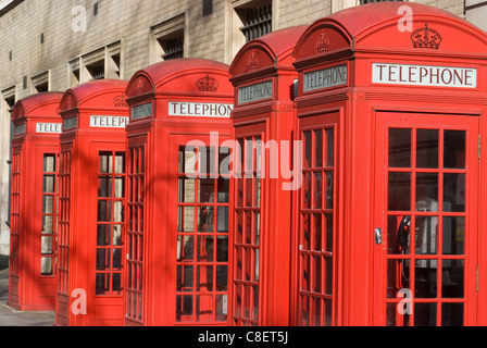 Row of old-fashioned red telephone boxes, Broad Court, near the Royal Opera House, Covent Garden, London, England,UK Stock Photo
