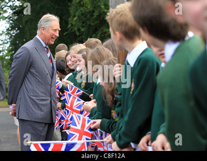 Britain's Prince Charles speaks with school children in Northern Ireland