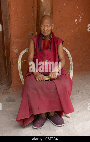 Monk outside of Sumtsek Temple, Alchi Village, (Ladakh) Jammu & Kashmir, India Stock Photo