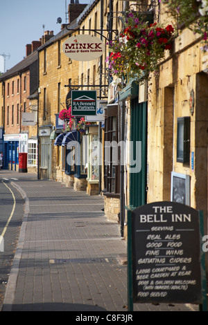 Buildings in High Street in Moreton in Marsh in the Cotswolds, Gloucestershire UK in July Stock Photo
