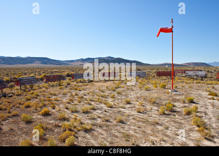 An image of a lonely windsock on a Nevada Desert Airport. Stock Photo