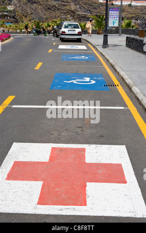 Ambulance and disabled reserved parking spaces, Isla de la Palma, Canary Islands, Spain Stock Photo