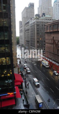 Wet autumn afternoon portrait 7th Avenue, towards Carnegie Hall and Central Park South, from Park Central Hotel Room, New York Stock Photo
