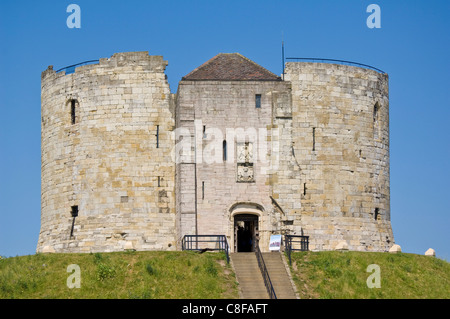 Clifford's Tower, the former Keep of York Castle, named after Roger de Clifford, York, Yorkshire, England,UK Stock Photo