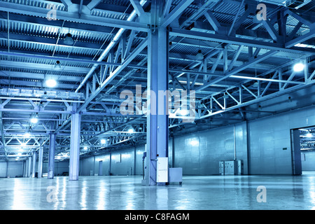 Empty storehouse toned in the blue color Stock Photo