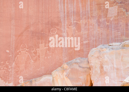 Ancient petroglyphs from the Fremont people on canyon wall, Capitol Reef National Park, Utah, United States of America Stock Photo