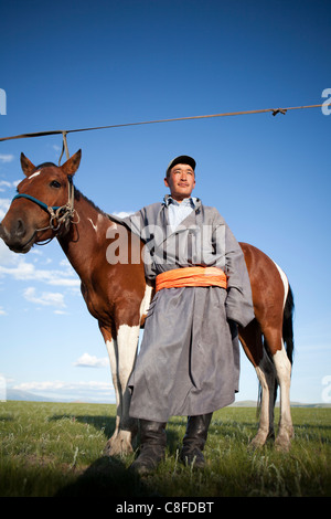 Nomad horseman mongolia Stock Photo - Alamy
