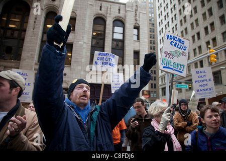 Detroit, Michigan - People rally at the Bank of America, demanding a moratorium on home foreclosures and evictions. The protesters included members of the United Auto Workers and activists from the Occupy Detroit encampment. Stock Photo