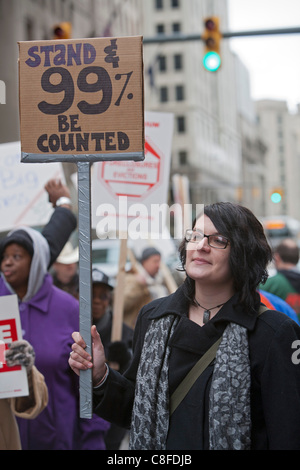 Detroit, Michigan - People rally at the Bank of America, demanding a moratorium on home foreclosures and evictions. The protesters included members of the United Auto Workers and activists from the Occupy Detroit encampment. Stock Photo