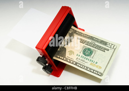 Your Own Private Money Printer at Work. Stock Photo