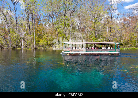 Visitors take boat ride on Silver River at Silver Springs State Park in Ocala, Florida Stock Photo