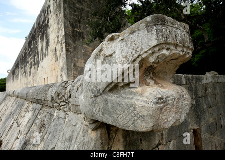 Massive stone carving of snake head, Chichen Itza, UNESCO World Heritage Site, Yucatan, Mexico Stock Photo