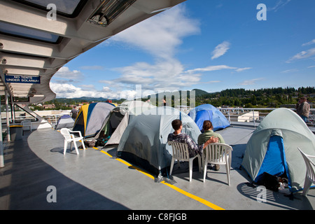 Tents on the deck of the Columbia ferry. Inside Passage route. Alaska. USA Stock Photo