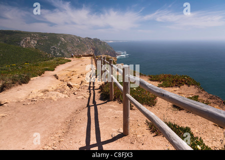 Cabo da Roca cliff path and wooden fence, western most point in mainland Europe Stock Photo