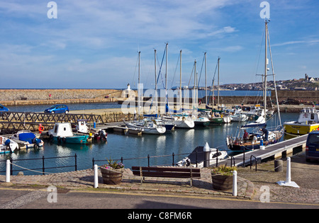 View over Banff marina harbour with moored  leisure vessels and to Macduff across the mouth of River Deveron Stock Photo