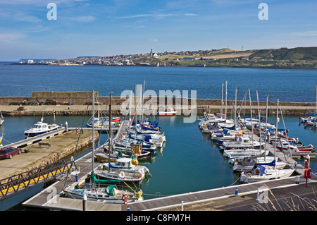 View over Banff marina harbour with moored  leisure vessels and to Macduff across the mouth of River Deveron Stock Photo