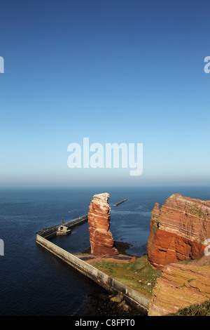 Cliff line of Heligoland with the Tall Anna, the landmark of Heligoland. Stock Photo