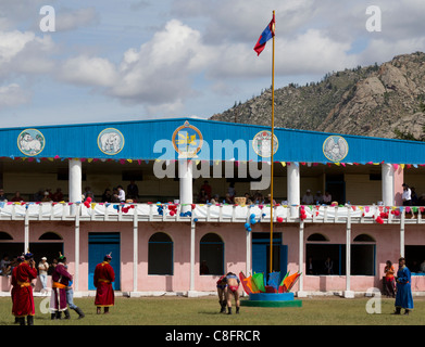 Wrestlers perform at the Tsetserleg Naadam Festival in Mongolia. Stock Photo