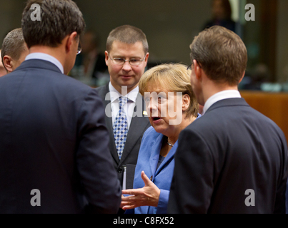 Pictured at the European Council were, German Chancellor Angela Merkel in conversation with, from left, Mark Rutte, Prime Minister. Valdis Dombrovskis, Prime Minister, Jyrki Katainen, Prime Minister Stock Photo