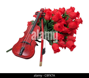 Classical wooden Violin on a bouquet of red roses - path included Stock Photo