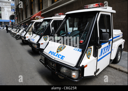 On Oct. 22, 2011, New York Police Department (NYPD) vehicles were lined up a block away from Zuccotti Park in Lower Manhattan where the Occupy Wall Street protesters are encamped. The NYPD has brought equipment and personnel from all over the city to police the demonstration. Stock Photo