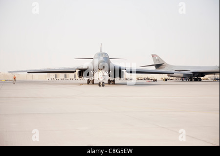 Staff Sgt. Daniel Gordon marshals a B1-B Lancer as it taxis at an air base in Southwest Asia before a combat mission Nov. 11, 2009. The multi-mission B-1 is the backbone of America's long-range bomber force. Sergeant Gordon is with the 37th Aircraft Maintenance Unit.