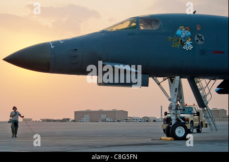 Tech. Sgt. Shaun Carroll performs preflight checks on a B-1B Lancer Nov. 11, 2009, in Southwest Asia. Sergeant Carroll is with the 37th Aircraft Maintenance Unit and deployed with the aircraft from Ellsworth Air Force Base, S.D. Stock Photo