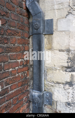 Old lead guttering down pipe Stock Photo