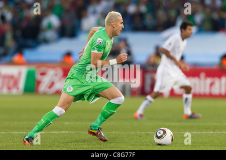 Hassan Yebda of Algeria in action against the United States during a FIFA World Cup Group C match at Loftus Versfeld Stadium. Stock Photo