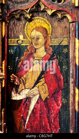 Ludham, Norfolk, rood screen, St. Apollonia holding pincers and tooth male saint saints English medieval screens painting Stock Photo