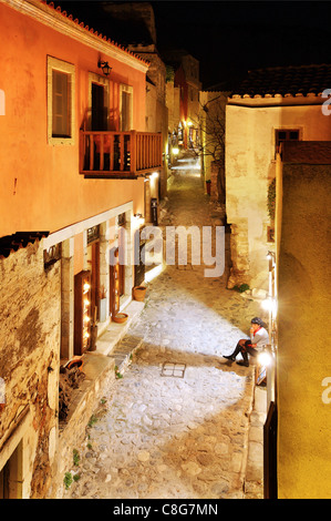 The central alley of Monemvasia, the one that goes from the entrance of the castle, to its main square. Peloponnese, Greece. Stock Photo