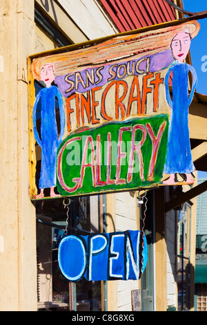 Sign for Sans Souci craft gallery on East Vermilian Street in downtown Lafayette, Lousiana, USA Stock Photo