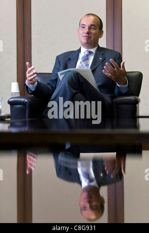 Michael C Woodford, former president and COO of Olympus Corp., talks during an interview at the company's Tokyo headquarters Stock Photo