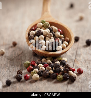 pepper in wooden spoon Stock Photo