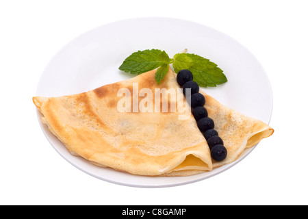 Light Crepe with blueberries, isolated on white background. Stock Photo